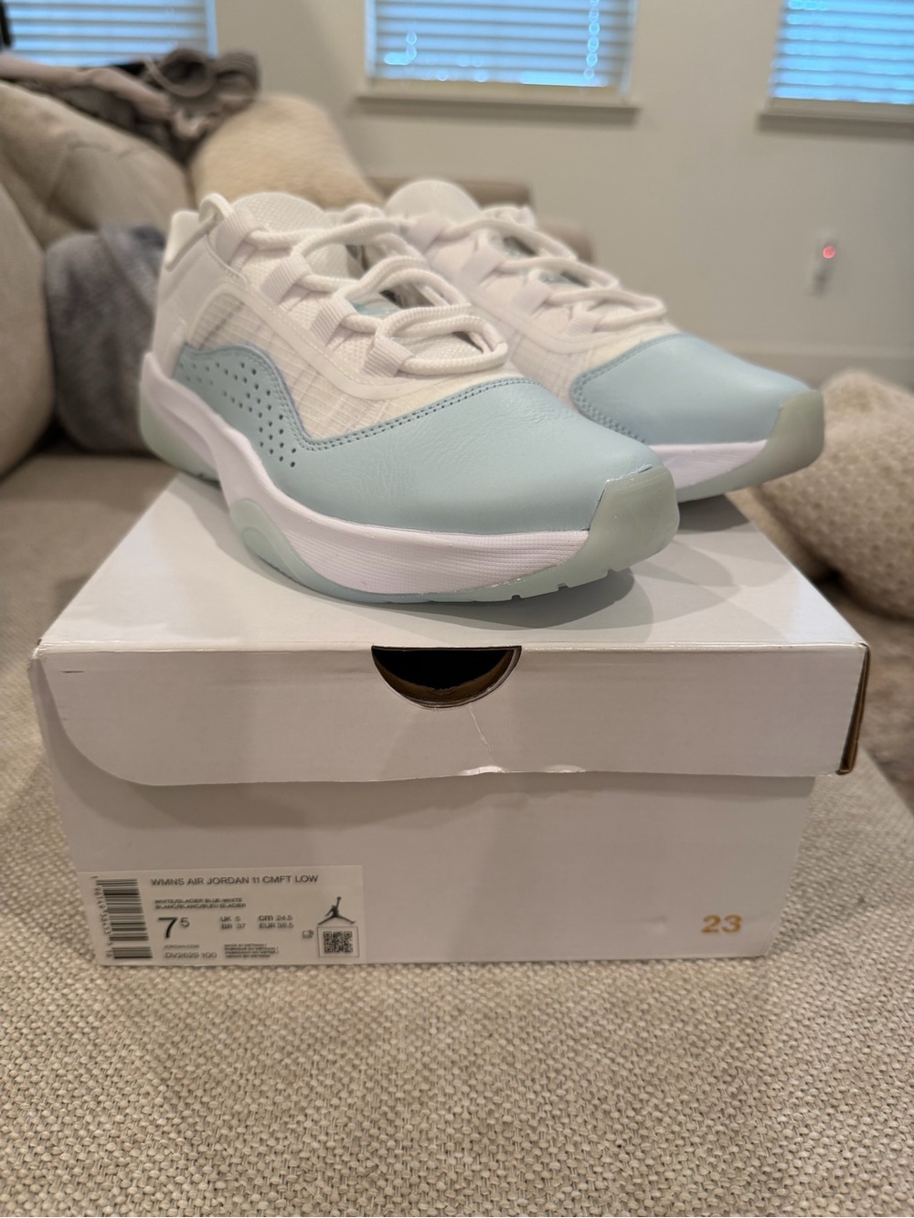 Nike Air Jordan 11 Women in White & Light Blue